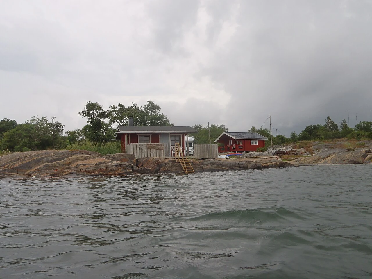 Summer shoreline and cottages in Åland