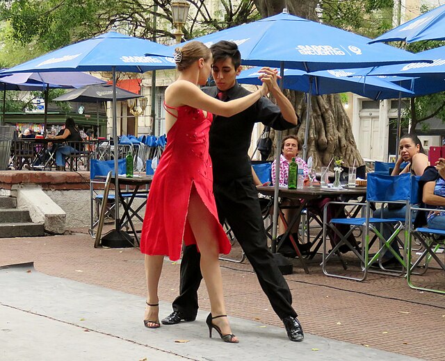 Couple dancing tango in the street