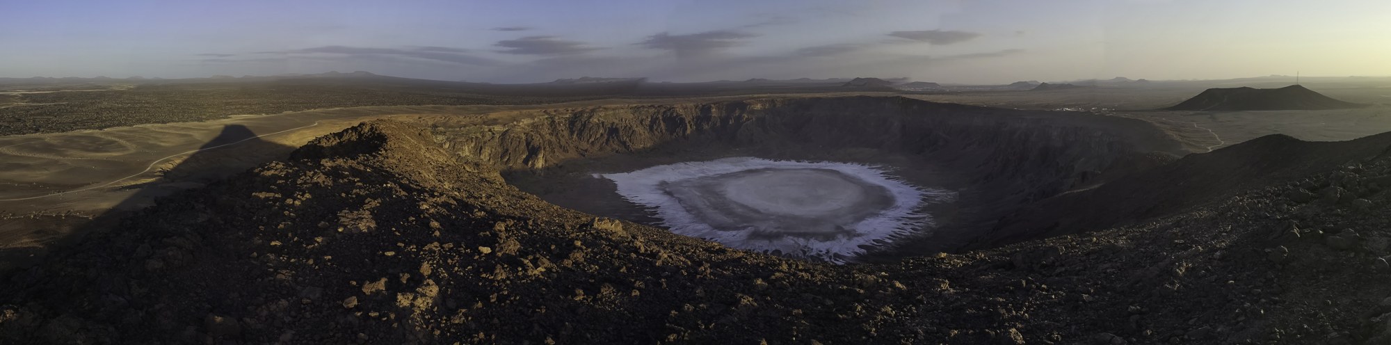 Al-Wahbah Crater, a pearly white volcanic crater in Saudi Arabia with a salt lake at its center